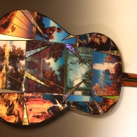 John Crutchfield of Metallic Art Graphics is comissioned to do a Maxfield Parrish Guitar